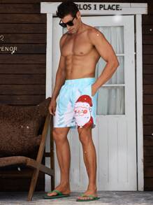 Manfinity Swimmode Pantalones cortos de playa con cordón en la cintura, bolsillos laterales y estampado de Papá Noel y copos de nieve para hombre, verano