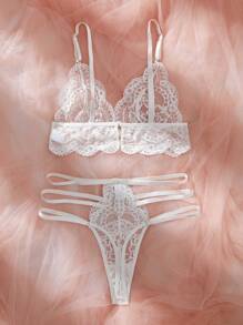 Set de 2 piezas de lencería de sostén y braga de encaje hueco de unicolor sexy para mujer