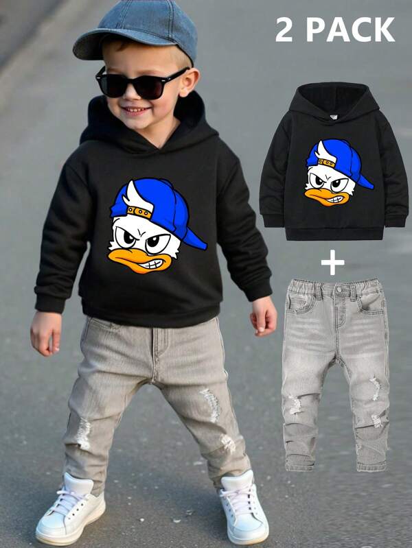 SHEIN Conjunto informal de 2 piezas para niño pequeño con sudadera con capucha oversize estampada con pato de dibujos animados y pantalones vaqueros, adecuado para niños en otoño/invierno