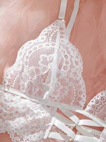 Set de 2 piezas de lencería de sostén y braga de encaje hueco de unicolor sexy para mujer