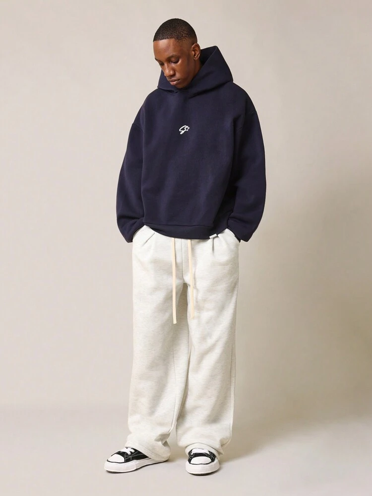 Moletom com capuz clássico com logotipo do time e letras do time universitário