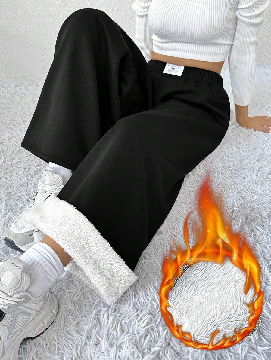 SHEIN EZwear Spodnie dresowe damskie Plus Size z elastyczną talią i szerokimi nogawkami, czarne - Czarne - Zobacz 1