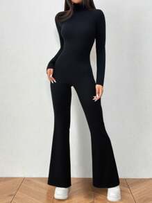 Flirla Mono negro de cuello alto con abertura, ceñido y con vuelo