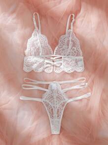 Set de 2 piezas de lencería de sostén y braga de encaje hueco de unicolor sexy para mujer