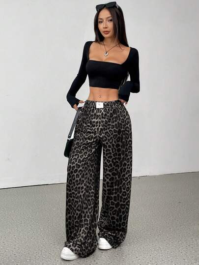 SHEIN EZwear מכנסי טרנינג רפויים בהדפס מותן אלסטי לנשים עם הדפס נמר