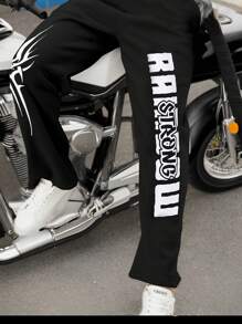 Manfinity Roughcore Pantalones de chándal casuales con cordón y bolsillos, con estampado de letras para hombre - Negro - Ver 1