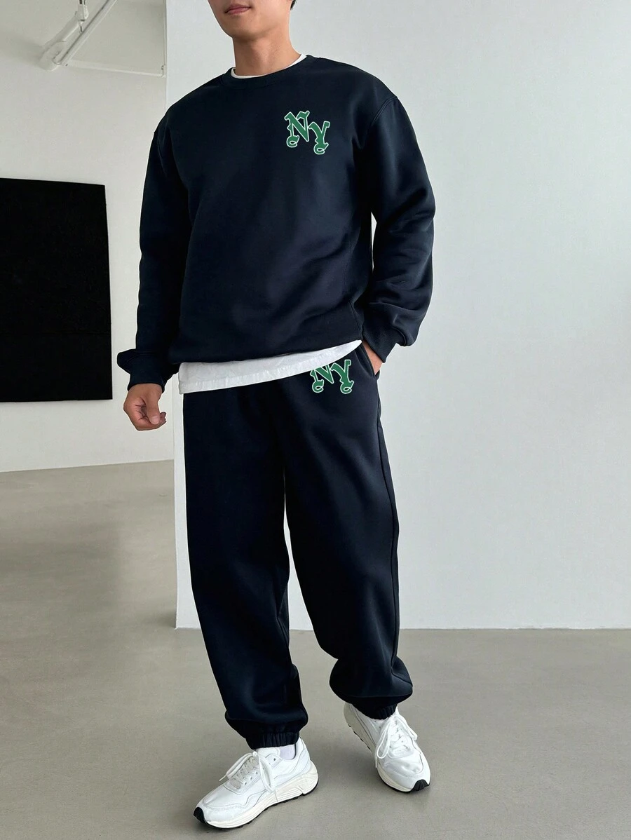 Conjunto de sudadera y pantalones regulares con estampado de letras para hombre