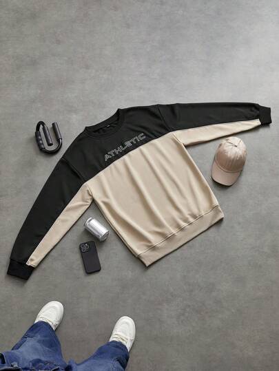 Manfinity Sport Corelite Sudadera informal con cuello redondo, estampado de letras y parches de colores contrastantes en estilo de novio para hombres