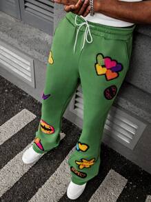 Manfinity EMRG 男士街头风格，INS 搭配高街嘻哈摇滚宽松字母刺绣略微喇叭形运动裤，非常适合音乐节和日常穿着，是送给男朋友或丈夫的理想礼物，体现街头服饰和 Y2K 美学。适合狂欢 - 綠色 - 查看 1