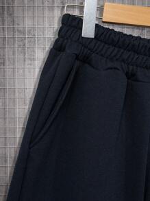 Conjunto de sudadera y pantalones regulares con estampado de letras para hombre