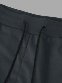 Manfinity Roghcode بنطال رياضي رجالي سميك بخصر مرن وسحاب، أحادي اللون، مناسب للخريف والشتاء - رمادي غامق - مشاهدة 6