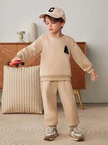 Cozy Pixies 2 件装小男孩恐龙印花柔软针织圆领套头连帽衫和抽绳裤套装