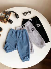 SHEIN 3pcs/Set Baby Boy/Girl Casual Daily Versatile Street Fashion Academy Style Black/Gray/Blue Smiling Face Print Knitted Sweatpants, Suitable For Home, Outdoor, Play - Multicolor - View 2