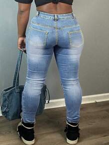 女款裝配有貨物口袋的修身牛仔褲