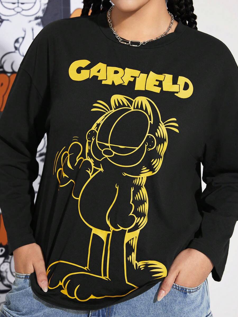 GARFIELD | SHEIN Camiseta negra informal de manga larga, cuello redondo y hombros caídos con gráfico de texto de dibujos animados para mujer talla grande, otoño - Negro - Ver 1