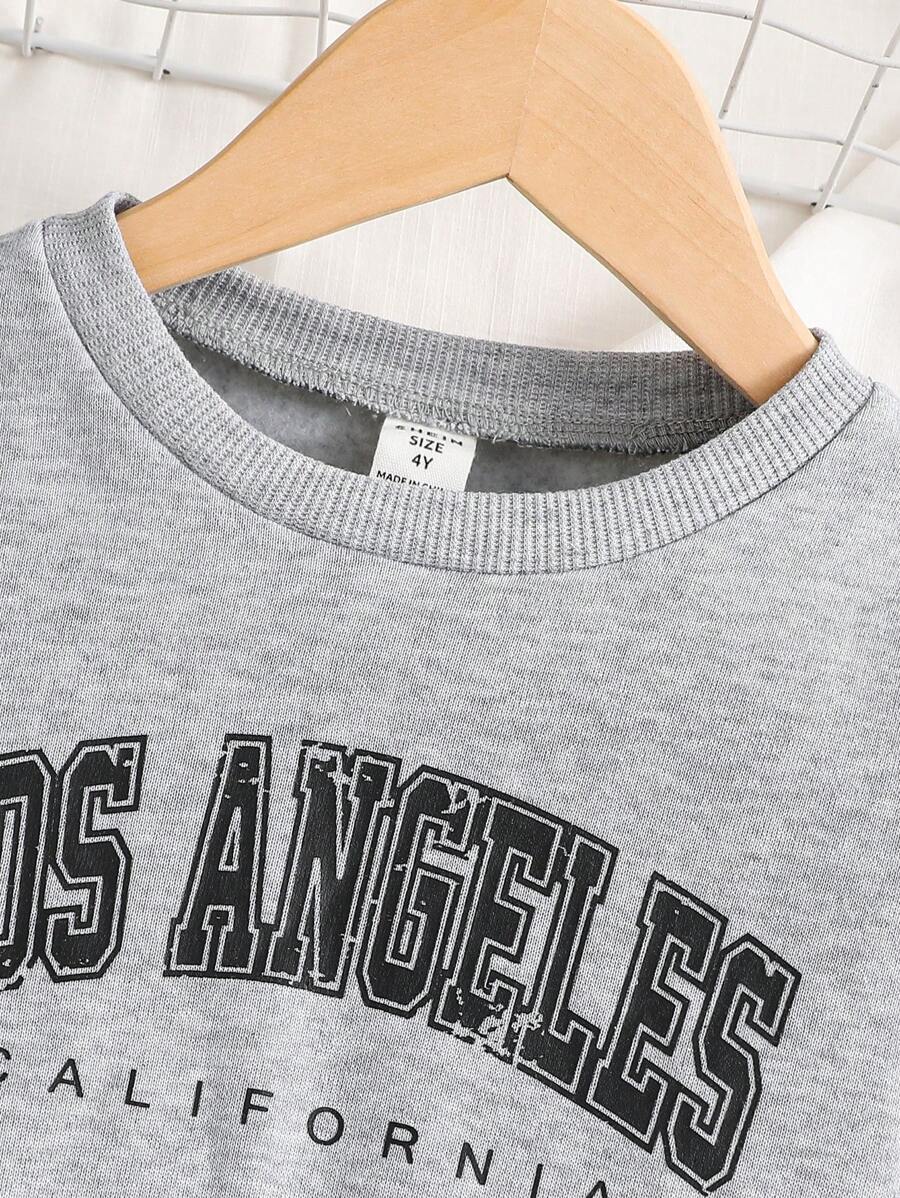 SHEIN Young Girl Knitted Clear Color Round Neck Letter Pattern Loose