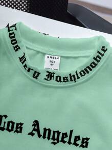 SHEIN Áo thun cổ tròn tay ngắn in chữ cái tiếng Anh vui nhộn thường ngày cho bé trai, thích hợp mặc hàng ngày, đi học, du lịch, tập luyện, mùa xuân/hè (đi chơi, nghỉ lễ, du lịch, thư giãn, tắm nắng, mùa hè) - Màu xanh Bạc hà - Xem 6