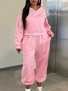 Maweii Conjunto de 2 piezas talla grande: sudadera holgada con bolsillo delantero y pantalón con cintura elástica para mujer, conjunto de atuendo informal - Rosa Pálido - Ver 1
