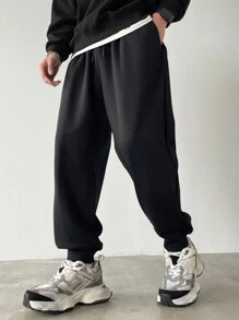 Manfinity Homme Quần nỉ bó ống côn màu trơn thường ngày cỡ lớn cho nam - màu đen - Xem 5