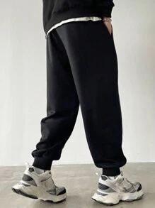 Manfinity Homme Quần nỉ bó ống côn màu trơn thường ngày cỡ lớn cho nam - màu đen - Xem 2