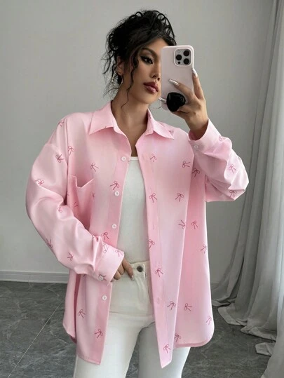 Rafferiza 女士粉色蝴蝶印花落肩宽松拼接口袋弧形下摆衬衫，春季款式