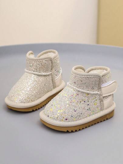 1 双女婴闪亮舒适保暖防滑平底雪地靴，适合户外日常穿着，秋冬季