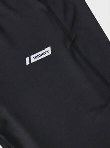 Manfinity Sport Corelite Boyfriend Style Men's Minimalist Breathable Letter Print Elastic Tight Fit Sports Leggings