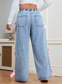 CovetEZ 大码休闲直筒牛仔裤，带蝴蝶结装饰和侧袋，适合春秋季节