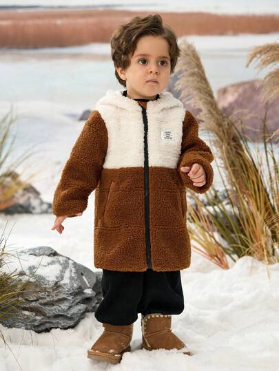 Baby/Toddler Contrast Color Patchwork Fleece Hoodie Jacket. The Fashionable Contrast Design And Cozy Fleece Material Provide A Warm And Stylish Outfit Choice For Babies. The Simple Yet Elegant Jacket Design Is Suitable For Various Occasions In Autumn And Winter.