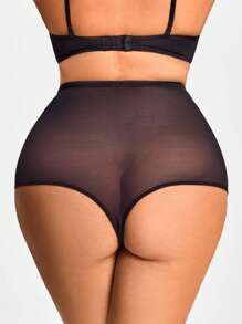 Body de talla grande de unicolor con Bottom transparente de malla de contraste que estiliza la figura