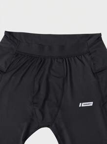 Manfinity Sport Corelite Boyfriend Style Men's Minimalist Breathable Letter Print Elastic Tight Fit Sports Leggings