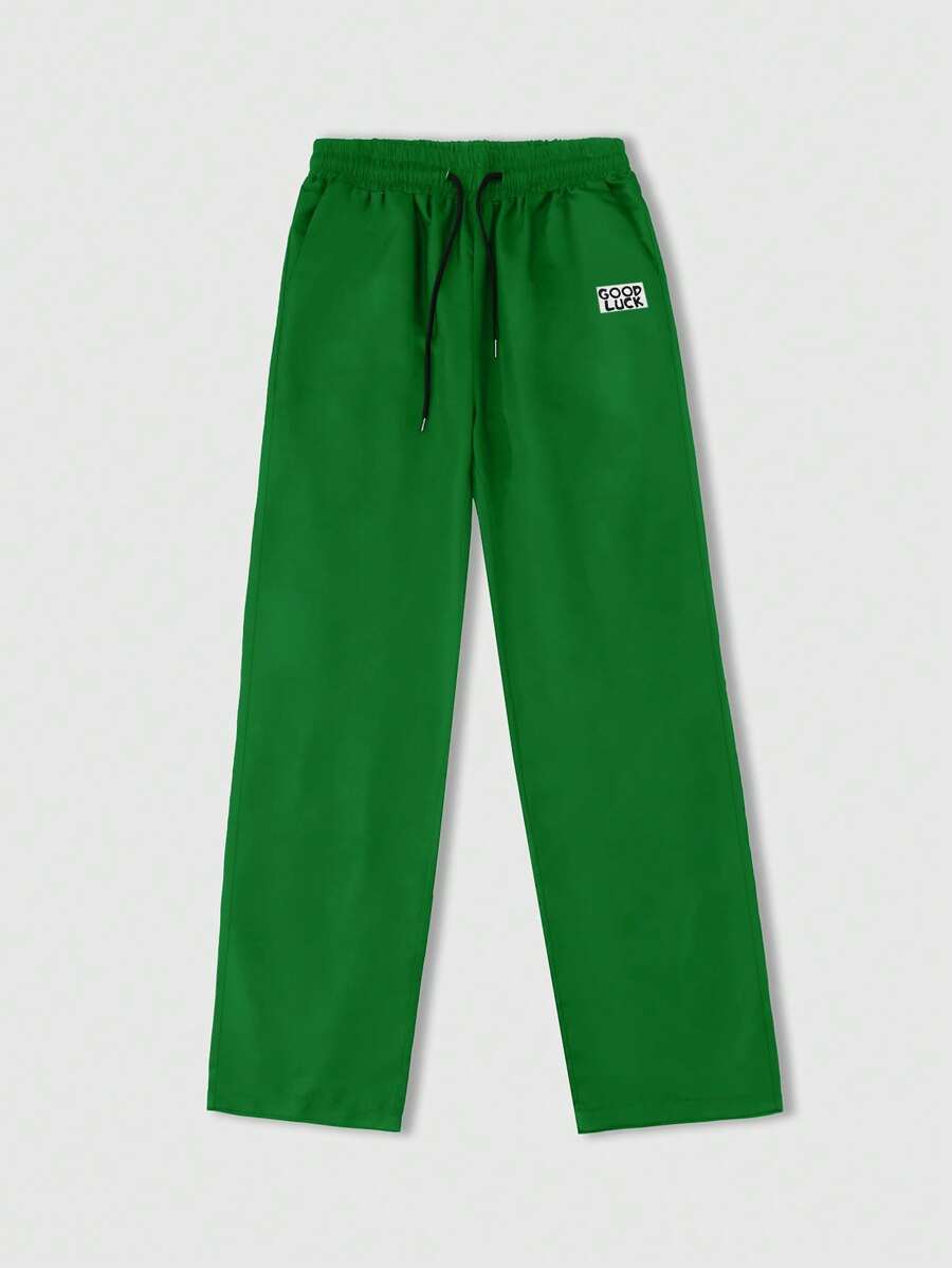 Manfinity Homme Pantalones de chándal informales con cordón en la cintura y estampado de letras para hombres de talla grande