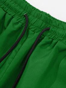 Manfinity Homme Pantalones de chándal informales con cordón en la cintura y estampado de letras para hombres de talla grande