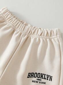 SHEIN 年轻男孩 2 件套休闲百搭运动学院标志连帽衫和裤子套装，适合秋冬季户外/街头/返校的衣服