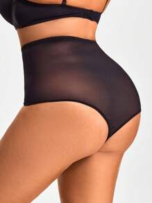 Body de talla grande de unicolor con Bottom transparente de malla de contraste que estiliza la figura