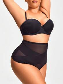Body de talla grande de unicolor con Bottom transparente de malla de contraste que estiliza la figura