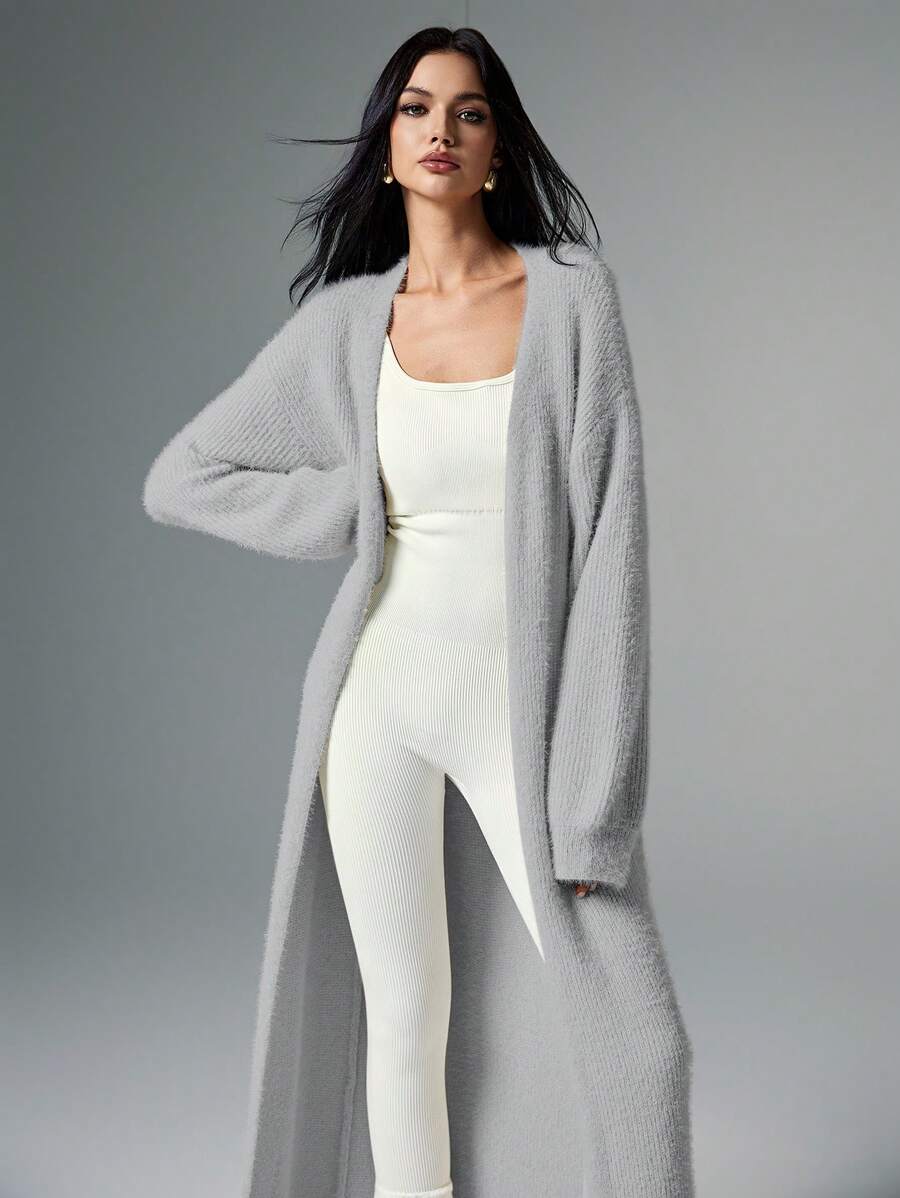 Poéselle 女士休闲纯色落肩宽松开衫秋冬季