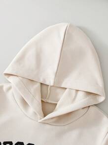 SHEIN 年轻男孩 2 件套休闲百搭运动学院标志连帽衫和裤子套装，适合秋冬季户外/街头/返校的衣服