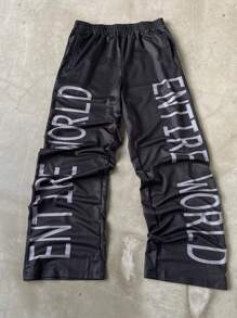 Manfinity Streetrush Pantalones deportivos casuales sueltos con estampado gráfico de letras, cintura elástica con bolsillo, para salir en otoño, ropa de calle holgada, regalo para el esposo o novio