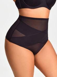 Body de talla grande de unicolor con Bottom transparente de malla de contraste que estiliza la figura