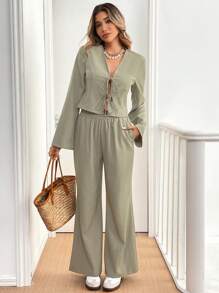 SHEIN Frenchy Winter Women Clothes 2pcs Women Casual Solid Bell Sleeve Front Tie Up Shirt And Loose Flared Pants Set, Women Set Thanksgiving Women Outfit Winter Women Coat Two Pieces Outfits Christmas Outfits Green - Green - View 4