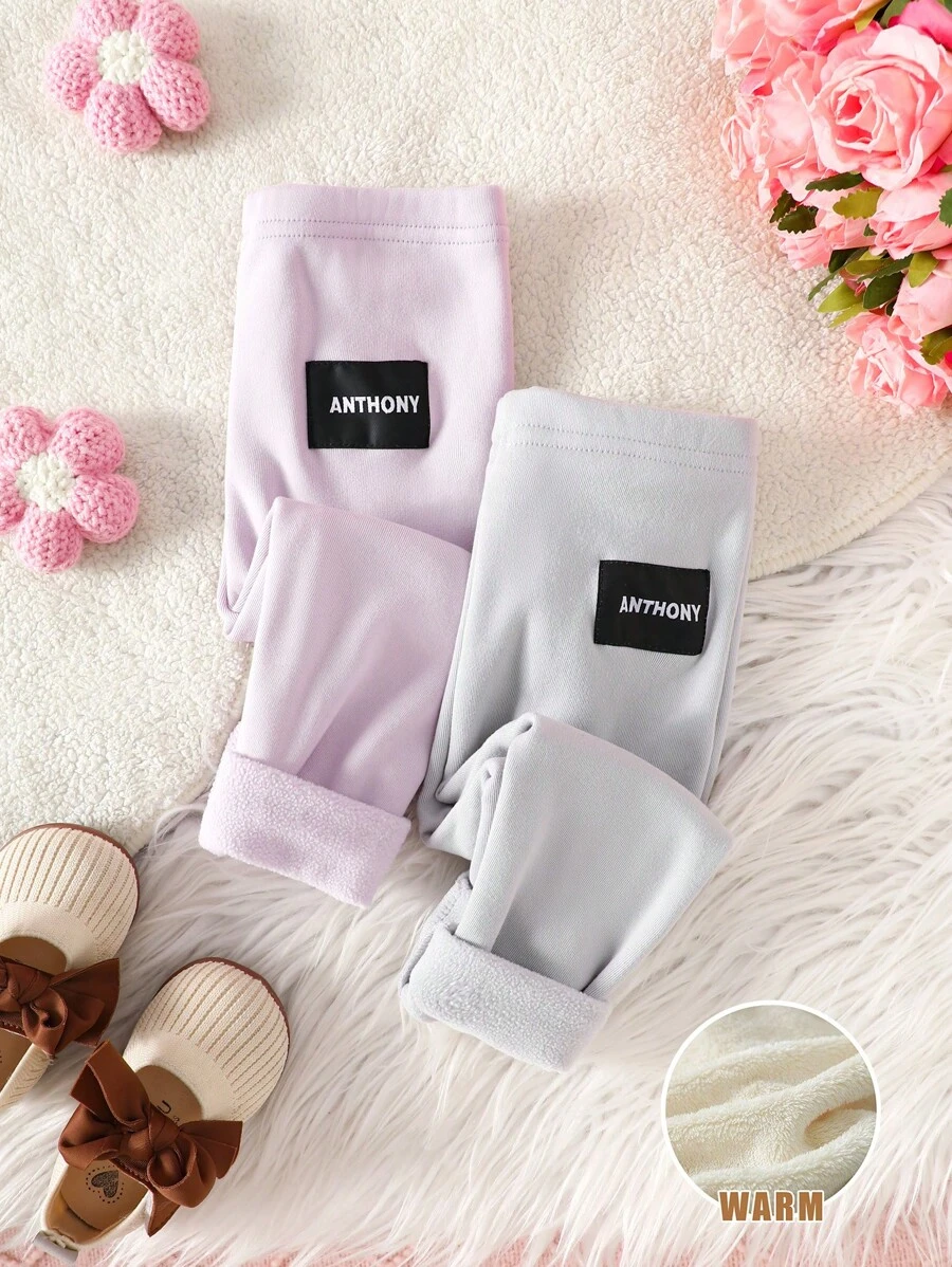 2 件套女婴字母印花保暖紧身裤