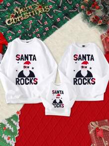 Sudadera blanca informal de cuello redondo talla grande, forrada térmica, holgada, cómoda, de moda, que estiliza la figura, sudadera navideña con estampado divertido de Papá Noel, Papá Noel con gafas de sol y estampado de bloques de color y estrellas, a juego con la familia