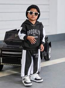 2pcs/Set Baby Boy Fall/Winter Casual Contrast Color Loose Sweatshirt & Jogger Pants Outfit, Fashionable And Comfortable For Daily Wear, Sports, Loungewear - Black and White - View 1