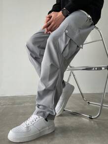 Manfinity Homme Pantalones anchos de talla grande con bolsillo con solapa, cintura con cordón y unicolor, estilo urbano para hombre