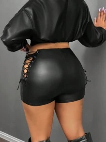 Slaydiva Nuevos pantalones cortos de mujer de PU negro con diseño de ojales y cordón, de talle alto, súper mini y estilo casual y sexy para la calle.