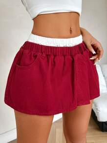 SHEIN PETITE Minifalda de mezclilla para mujer, cintura ultra baja y estilo patchwork sexy