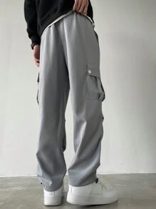 Manfinity Homme Pantalones anchos de talla grande con bolsillo con solapa, cintura con cordón y unicolor, estilo urbano para hombre