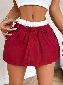 SHEIN PETITE Minifalda de mezclilla para mujer, cintura ultra baja y estilo patchwork sexy