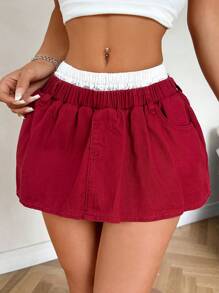 SHEIN PETITE Minifalda de mezclilla para mujer, cintura ultra baja y estilo patchwork sexy